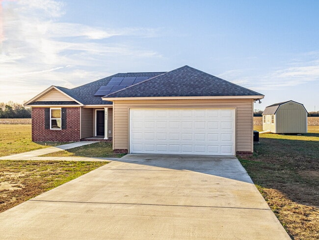 Photo - Available now! Has solar panels!