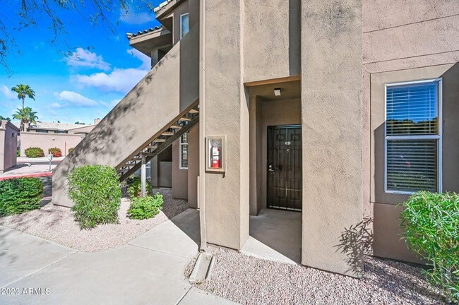 Building Photo - 7009 E Acoma Dr Unit 1076