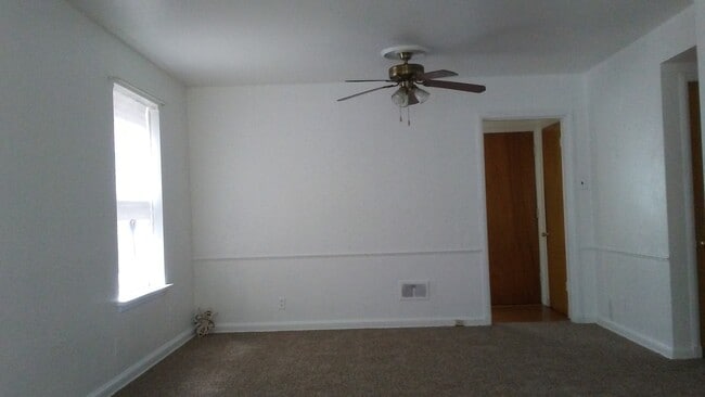 Spacious living room - 8804 Riverview Blvd Unit AptA