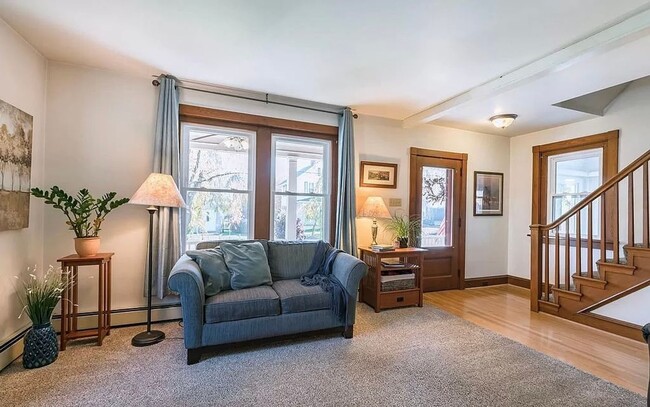 Photo - Spacious 4-Bedroom Home with Sunroom, Garage & Private Driveway!