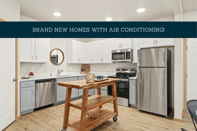 Building Photo - The Douglas at Sunrise