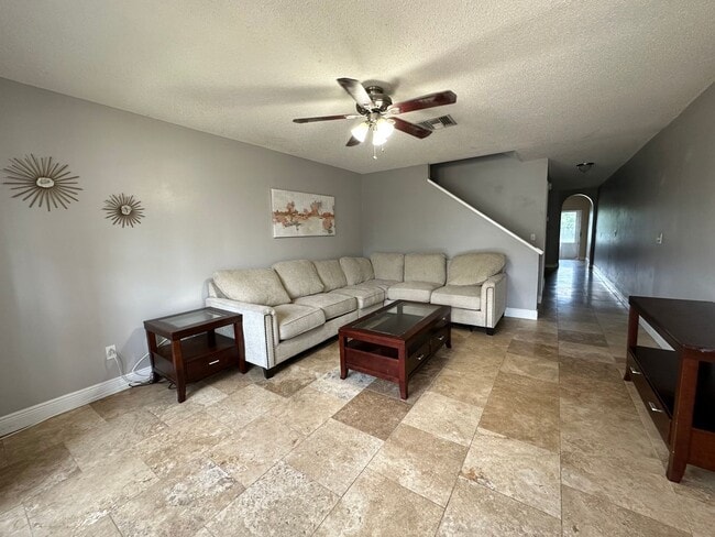 Photo - Beautiful Townhome in a gated community with assigned parking spots and a community pool