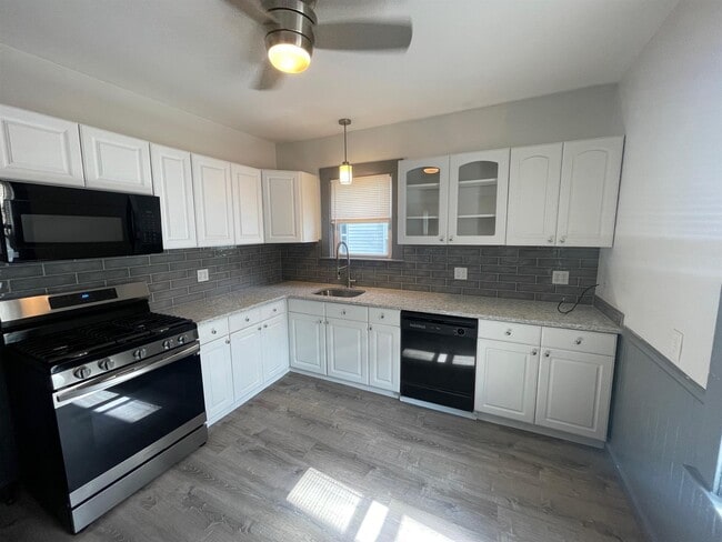 Building Photo - 4 Ossipee Rd Unit 1