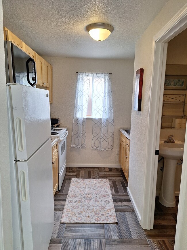 Entry to Kitchen - 3332 Larch Way Unit Studio