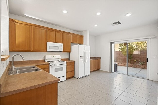 Photo - Elegant 3 Bedroom Home with Gourmet Kitchen, Office, & Landscaped Backyard