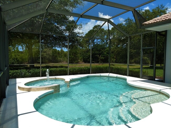 Photo - Annual Rental: Luxurious 4 Bedroom 3 bath POOL home in Woodlands of Rivendell! Just Blocks form P...