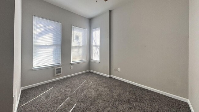 Photo - Move-In Ready 3-Bedroom Home with Stylish Hardwood-Style Flooring
