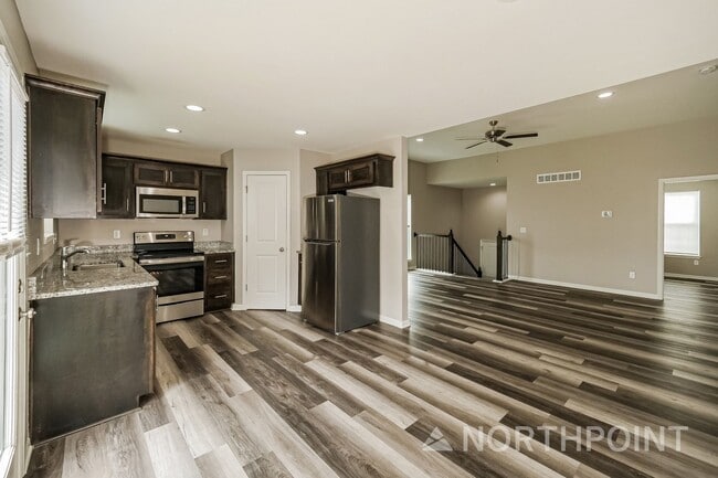 Photo - 4 BR/3BA | Newly Renovated Single Family Home | 1-Car Covered Parking | Huge backyard!