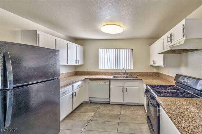 Building Photo - 3957 Rebecca Raiter Ave Unit 202