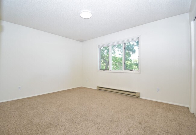 Photo - Top floor apartment! Close to MSU and downtown! Unit 63