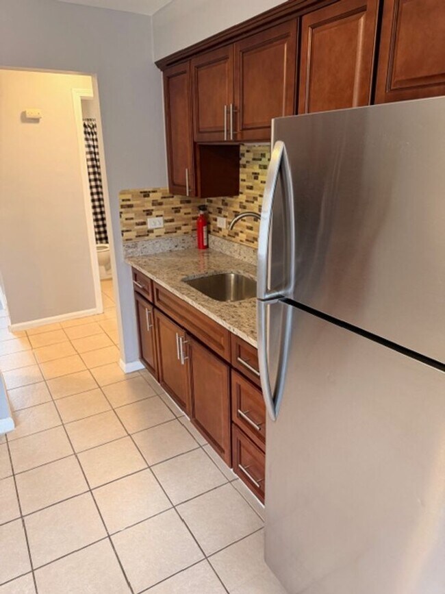 Photo - Charming 3-Bedroom Home with Private Yard in a Prime Location!