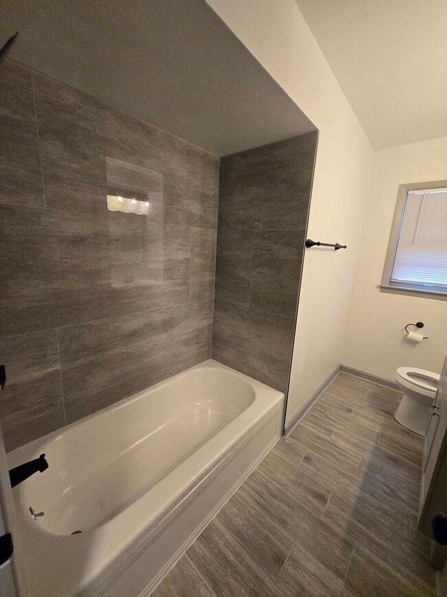 Photo - Fully Renovated Beauty with Spacious Kitchen, Separate Living Areas & Modern LVP Flooring