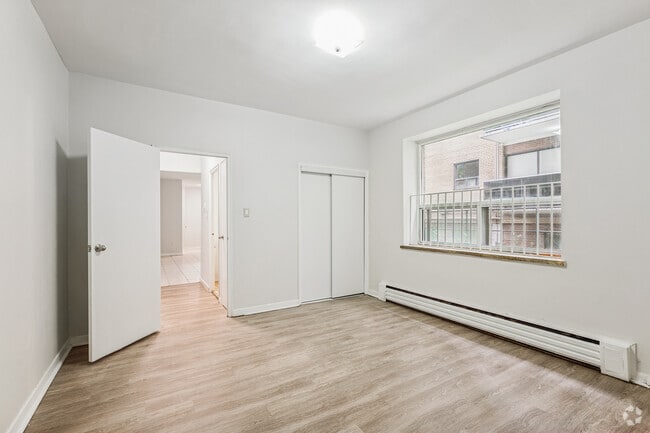 2BR, 1BA - Primary Bedroom - WELLINGTON APARTMENTS