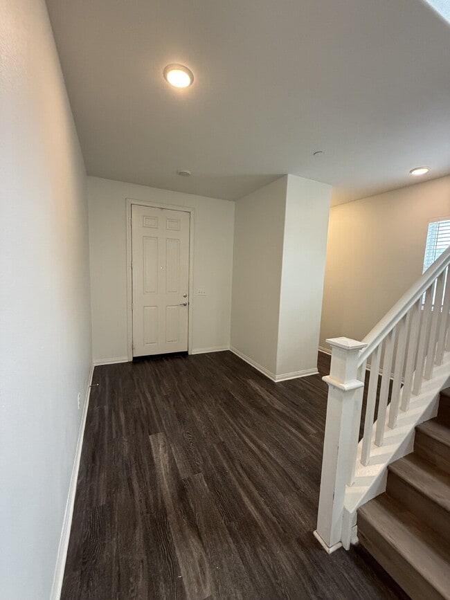 Photo - New flooring & paint!  Large backyard - landscaped and ready for garden!   Community pool, fitnes...