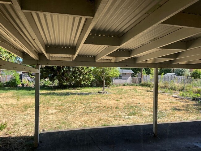 Photo - New flooring, New Paint. Garage & Carport