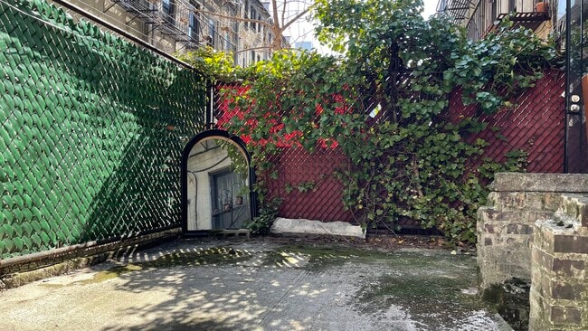 backyard - 215 E 88th St Unit 1D