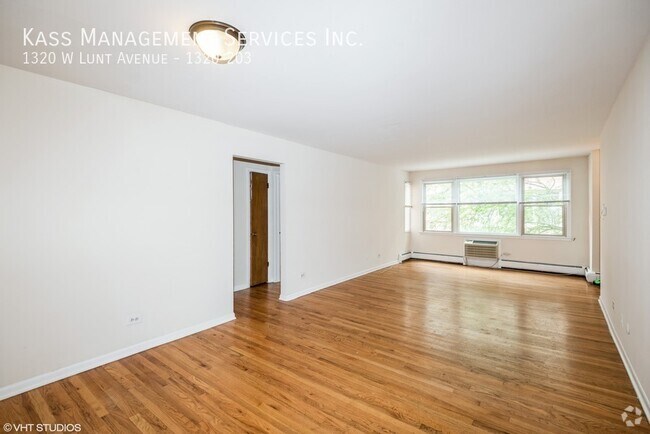 Building Photo - 1320 W Lunt Ave Unit 1320-203 Rental