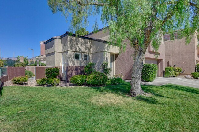 Photo - Situated on a beautifully landscaped oversized corner lot within the gated community of Desert Bl...