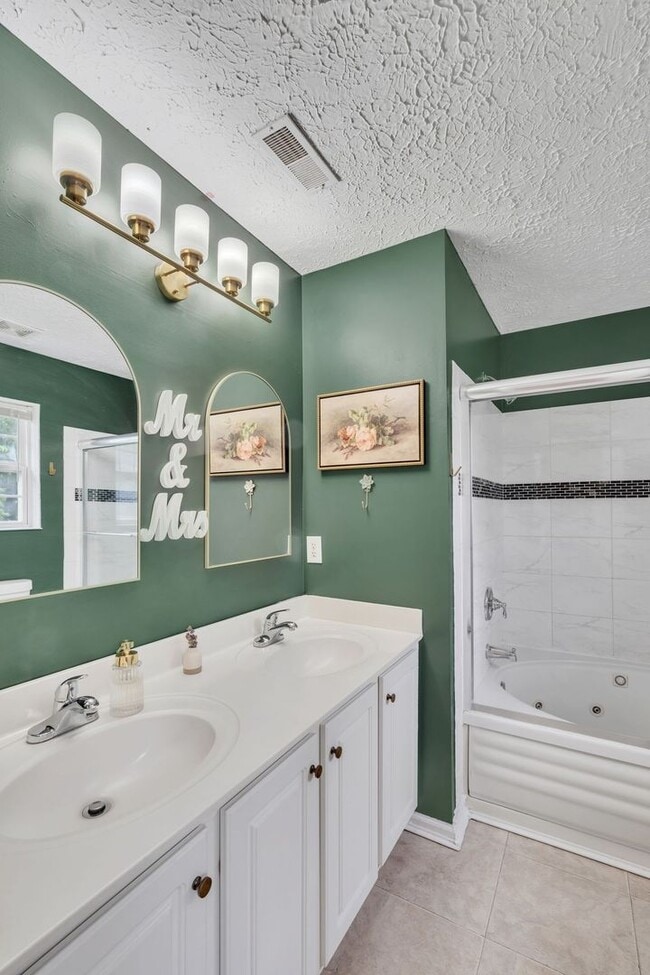 Photo - Three bed two bath home with 2 car garage. Less than 7 miles from airport & close to Percy Priest...