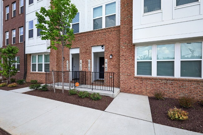 Photo - Stunning 2-Level Top Floor Condo with Tesla Charger & 70" TV – Farmstead District
