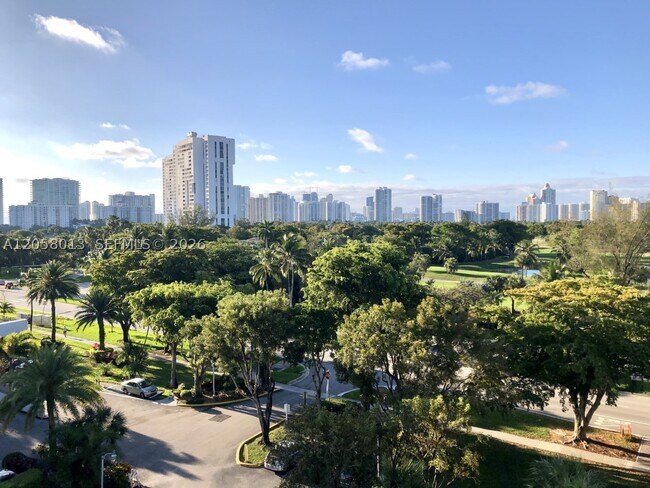 Building Photo - 3301 N Country Club Dr Unit 712