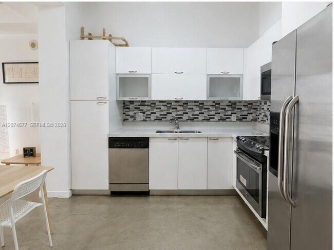234 NE 3rd St Unit 206