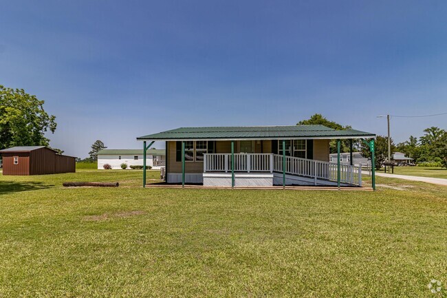 Building Photo - 2 BR, 1 BA W/ FENCED-IN YARD, COVERED FRON... Rental