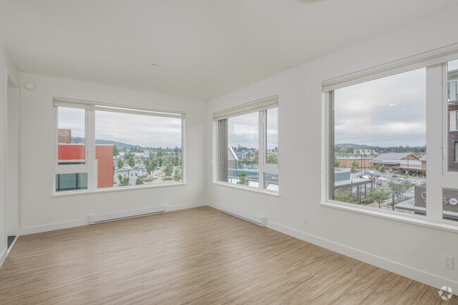 2BR, 2BA – 855SF - Living Room - Crossing at Belmont