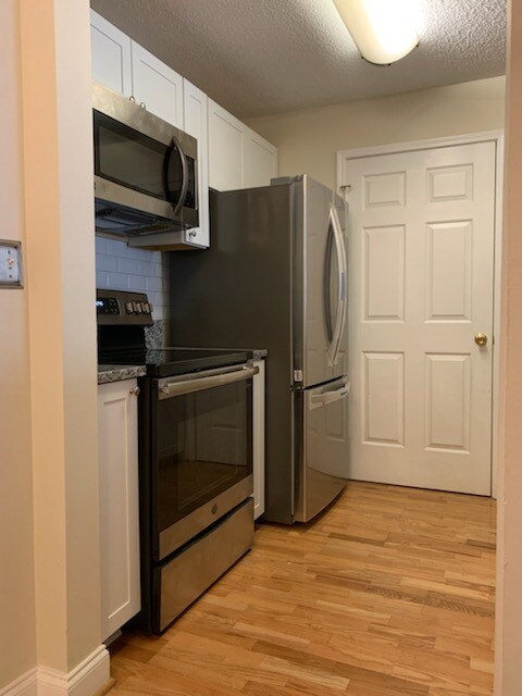 NEW KITCHEN VIEW - 1075 Peachtree Walk NE Unit A205