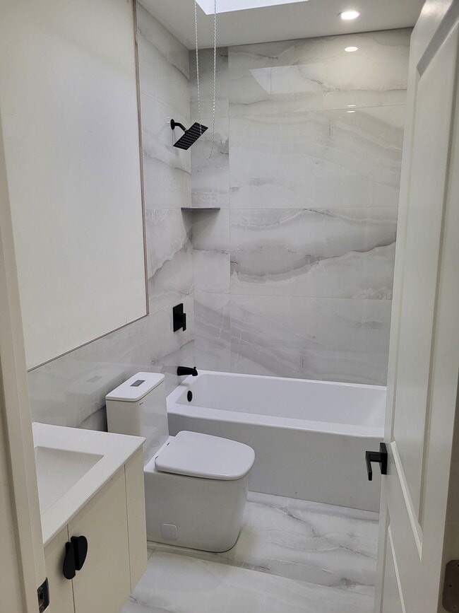 2nd floor full bath with skylight - 1164 Atwood Rd