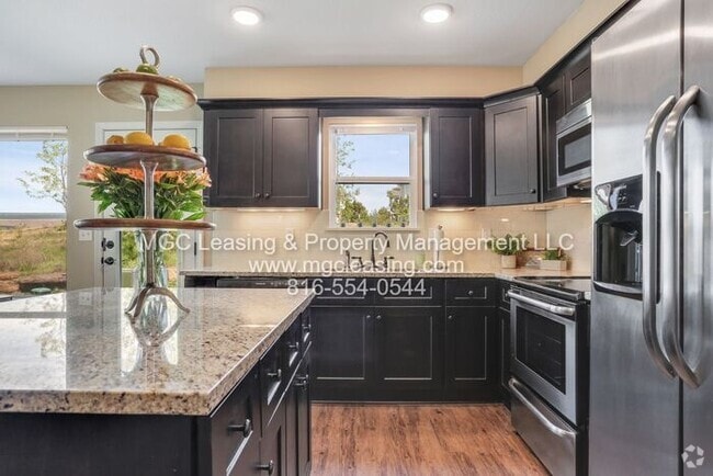 Building Photo - Serrano Townhomes with walk out finished b...