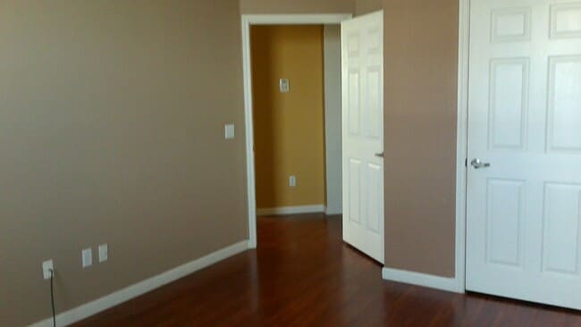 Photo - Beautiful 1/1 corner unit with upgraded wood floors a large balcony with an Orange Avenue view.