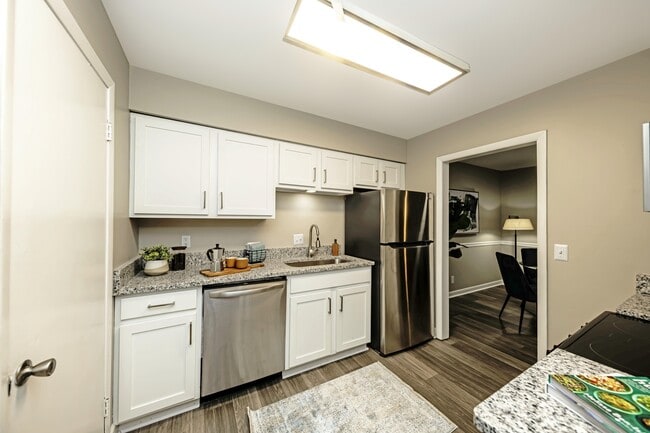 Kitchen with granite countertops and stainless steel appliances