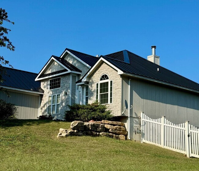 Photo - Stunning 4BR 5BA Home w/ Garage & Deck • Full Kitchen Suite • Deck in Platte City