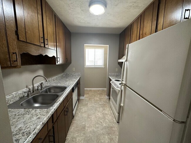 Photo - Upstairs unit ON THE GOLF COURSE! Unit D