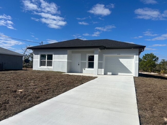 Photo - Brand-New Modern 2BR/2BA Home with Garage- In Serene Lake Placid Location