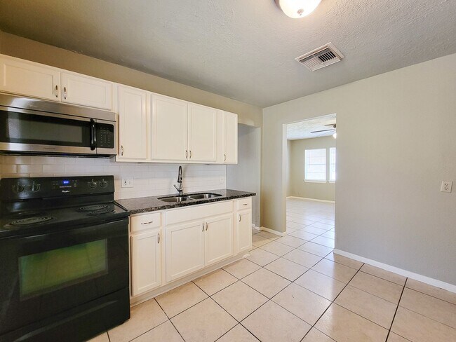 Photo - Nice 3 bedroom home that is conveniently situated near local stores and easy access to us 288. Th...