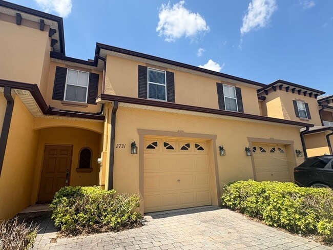 Building Photo - Gated 3B/2.5B Sanford Townhome ~ Fresh paint! ~ New flooring!