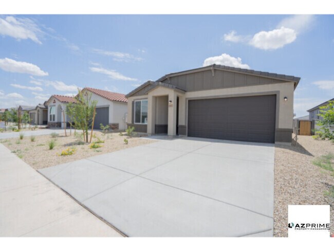 Building Photo - Exceptional 4/3 Surprise Home with Modern ...