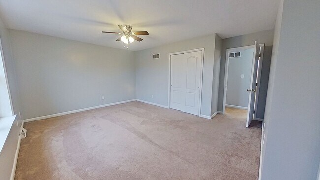 Photo - Move-In Ready 2BR Townhouse w/ Central AC & Off-Street Parking