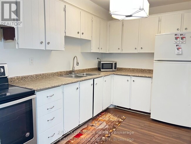 Photo - 4064 Lawrence Ave E Unité 604