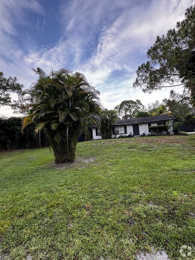 Building Photo - 6669 Royal Palm Beach Blvd Rental