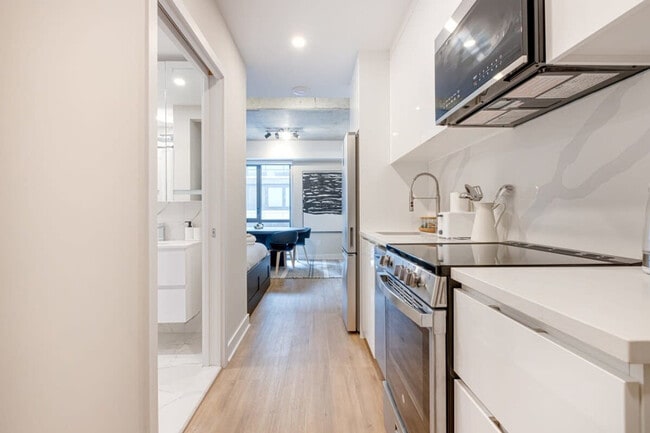 Photo - 742 Rue William Unit FL2-ID1294671P