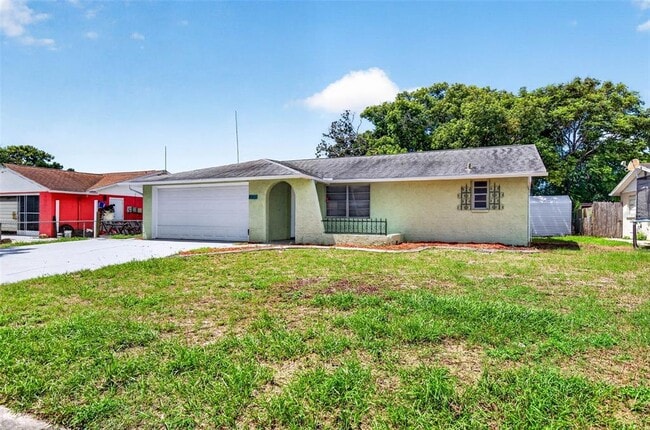 Building Photo - 8905 Tropical Palm Way