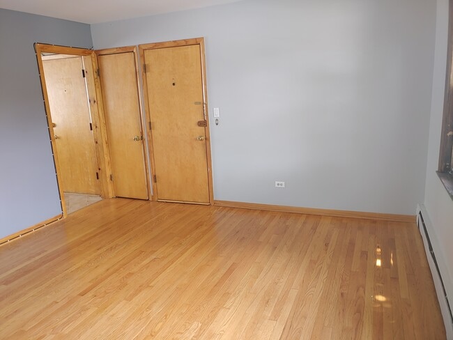 Building Photo - 6360 W Eddy St Unit A1