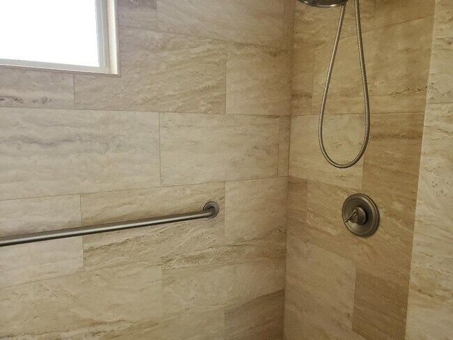Shower design with grab bar - 6248 Teesdale Ave Unit Guest House