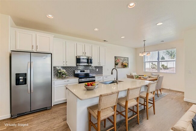 Photo - Modern 3BR Townhome | 2-Car Garage | Pool, Gym & Light Rail Access