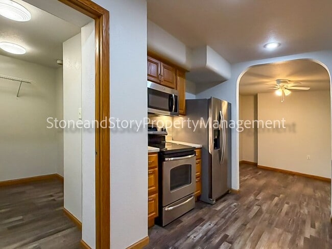 Photo - 2 bedroom 1.5 bath duplex with sunroom, 2 car garage and fenced yard