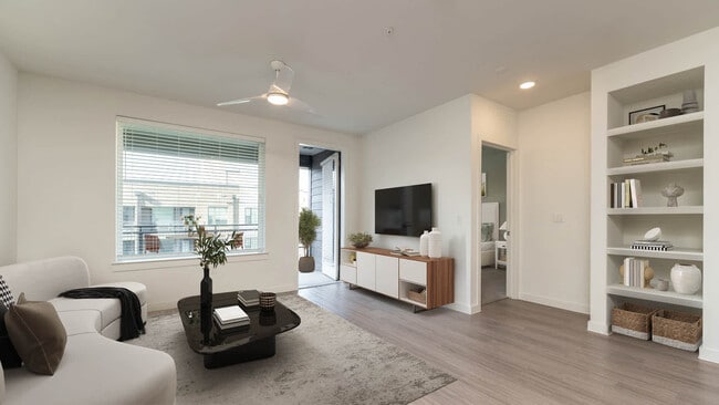 Living Room with Balcony and Hard Surface Flooring