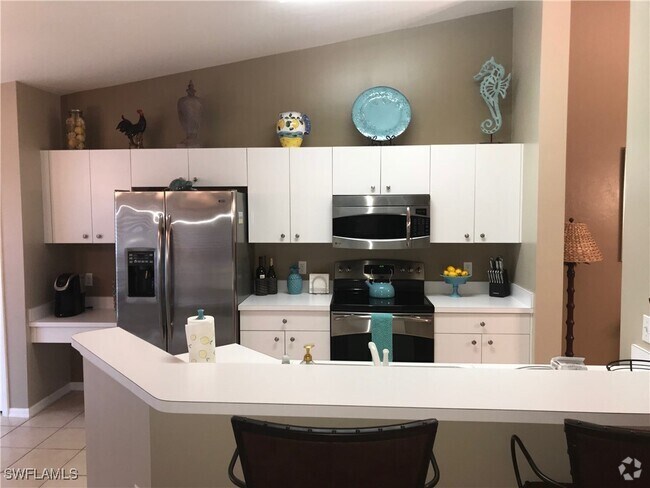 Building Photo - 2855 Cypress Trace Cir Unit 202 Rental